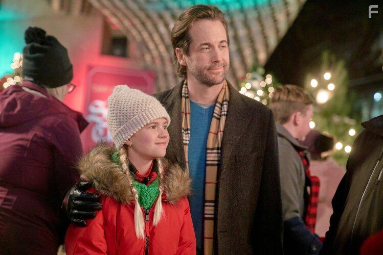 Myla Volk and Niall Matter in Holiday Hotline (2023)