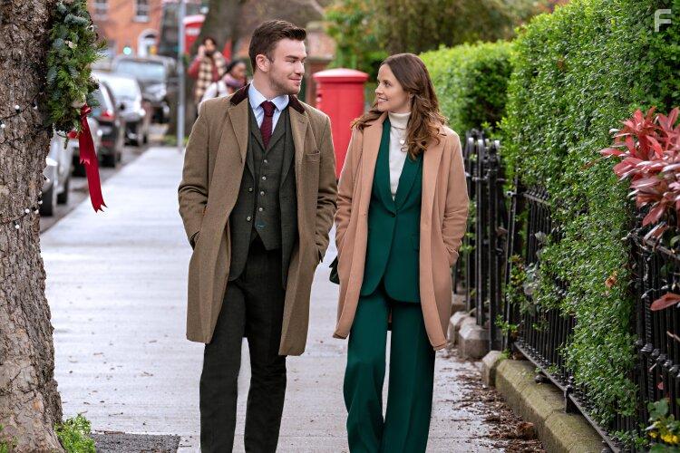 Sarah Ramos and Peter Rothwell in Christmas in Notting Hill (2023)