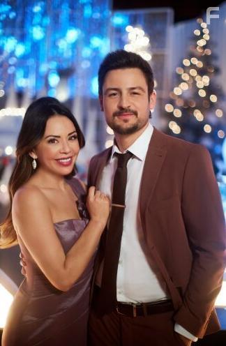 Tyler Hynes and Janel Parrish in Never Been Chris'd (2023)