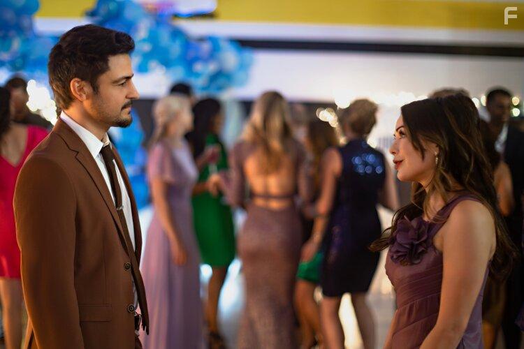 Tyler Hynes and Janel Parrish in Never Been Chris'd (2023)