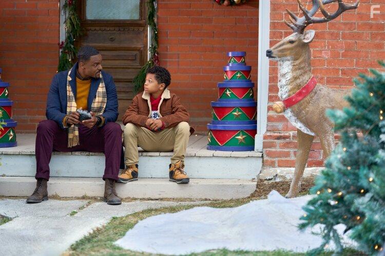 Jayd Deroch and Ronnie Rowe in Christmas with a Kiss (2023)
