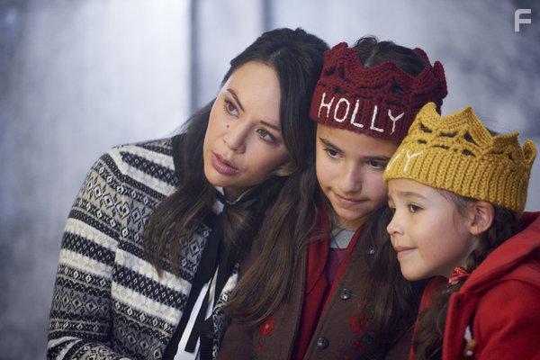 Janel Parrish, Piper Rubio, and Sadie Coleman in Holly & Ivy (2020)