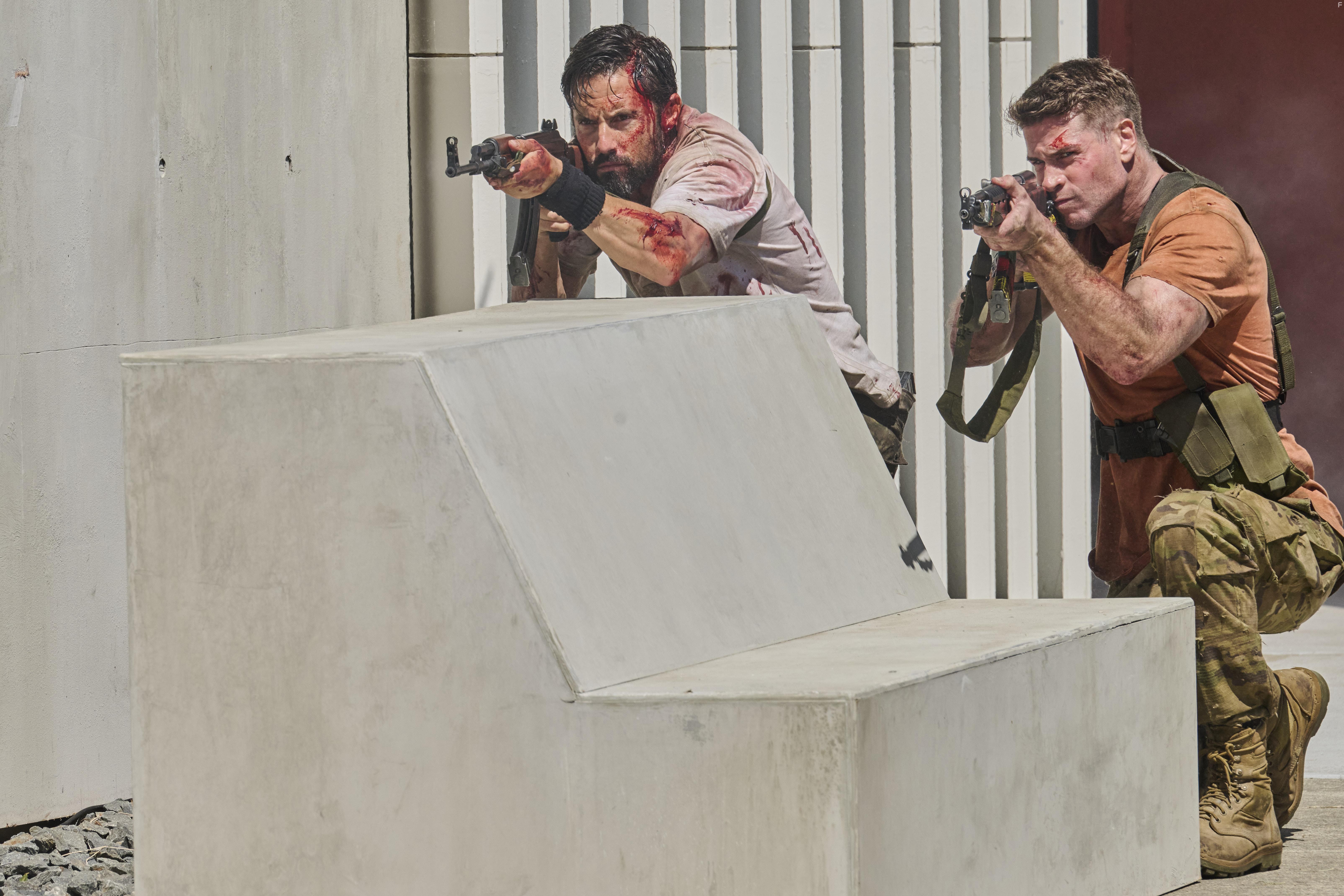 Milo Ventimiglia and Liam Hemsworth in Land of Bad (2024)