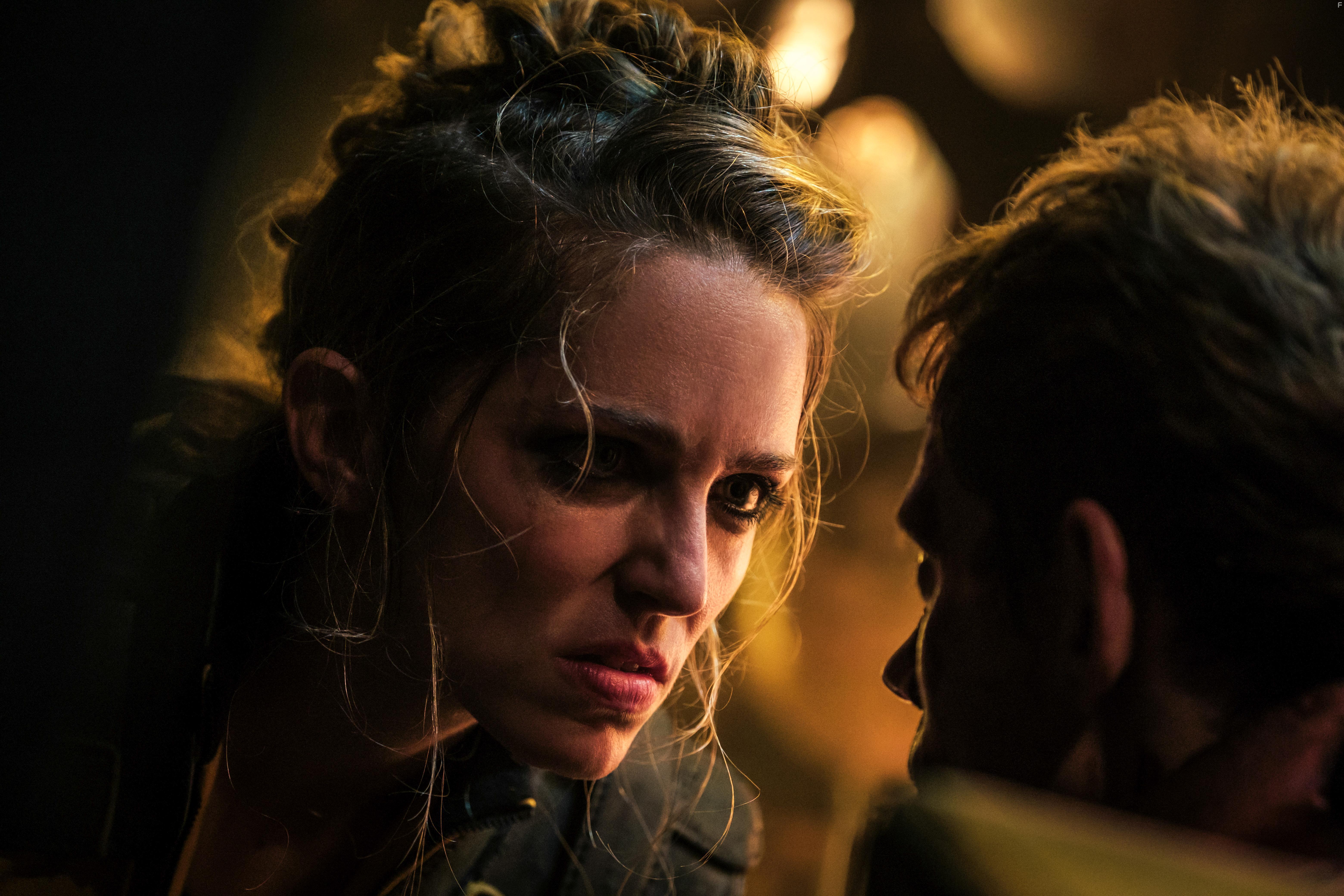 Bill Skarsgrd and Jessica Rothe in Boy Kills World (2023)