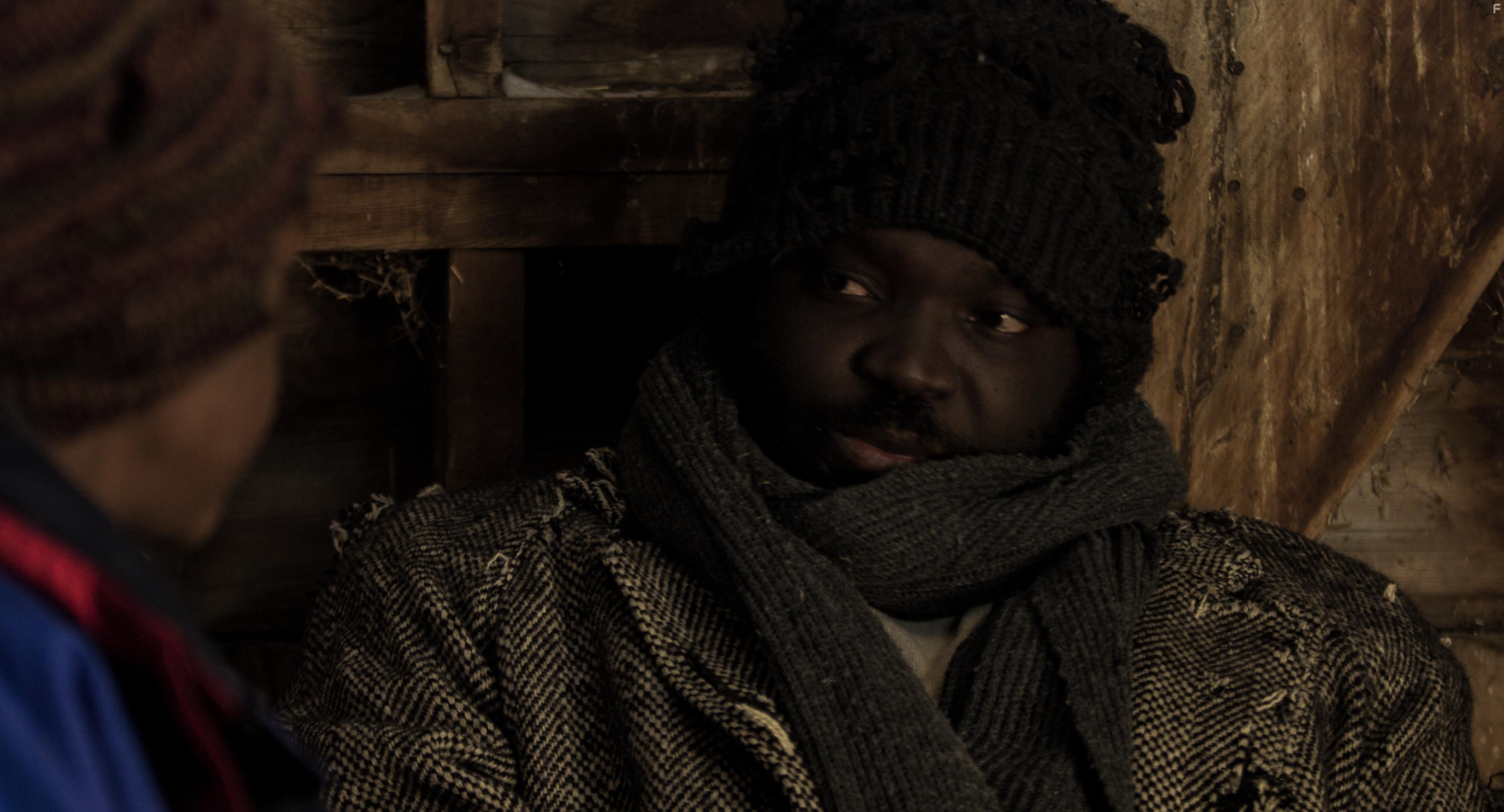 Ed Ogum and Susan Ruth Kamunya in Father of Nations (2022)