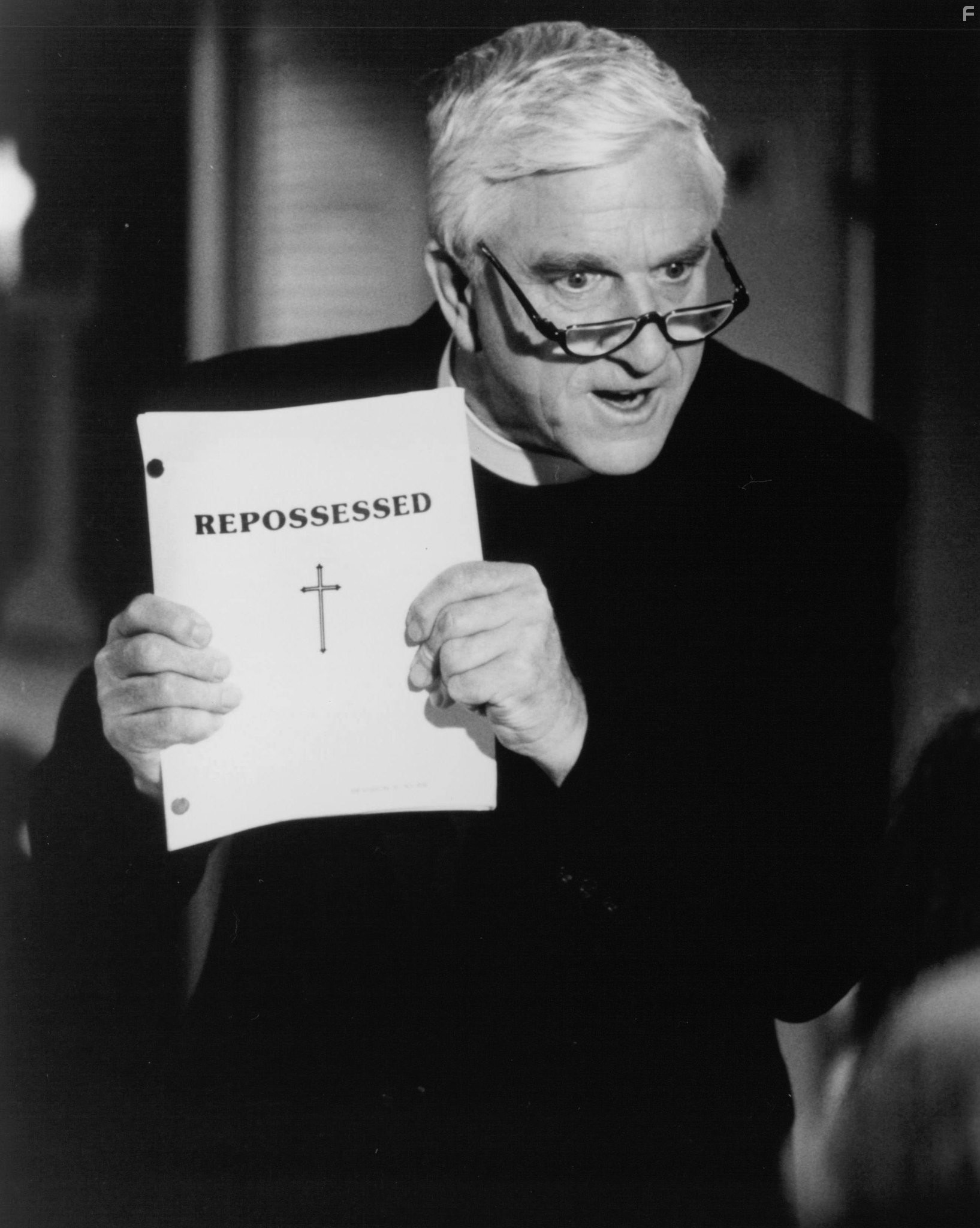 Leslie Nielsen in Изгоняющий заново (1990)