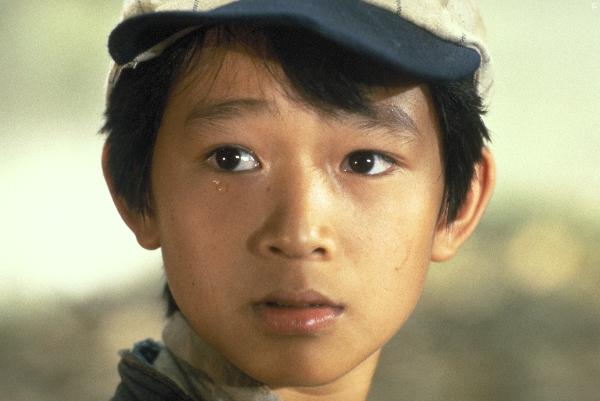 Jonathan Ke Quan in Индиана Джонс и Храм судьбы (1984)