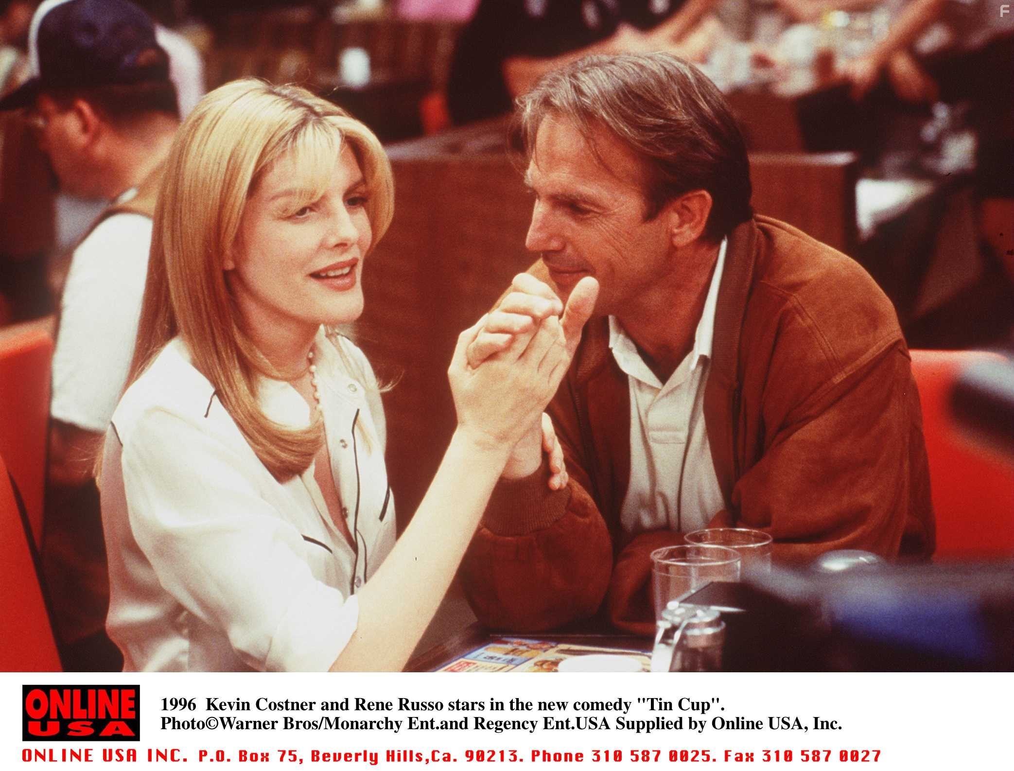 Kevin Costner and Rene Russo in Жестяной кубок (1996)