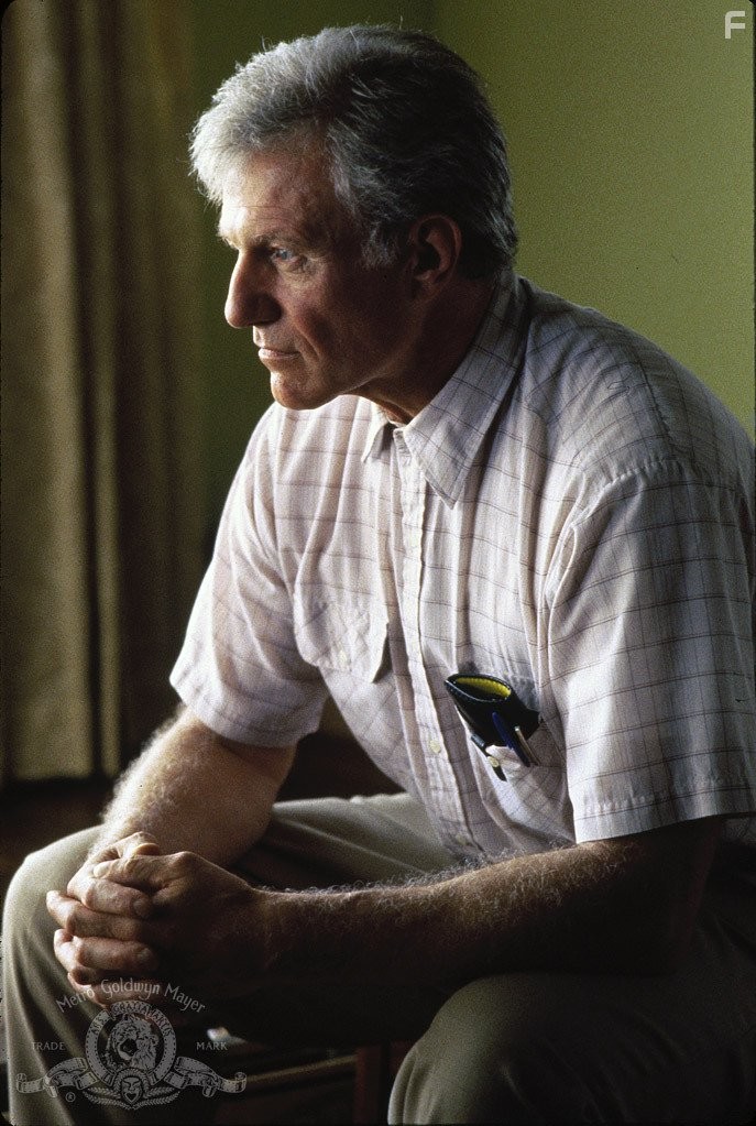 Raymond J. Barry in Мертвец идет (1995)