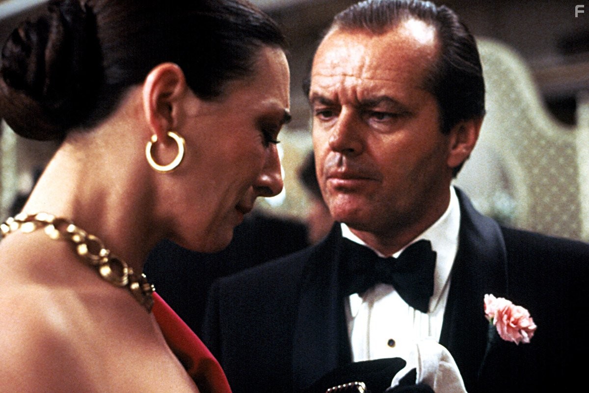Jack Nicholson and Anjelica Huston in Честь семьи Прицци (1985)