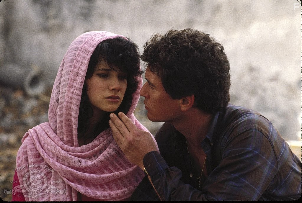Tom Berenger and Daphne Zuniga in Last Rites (1988)