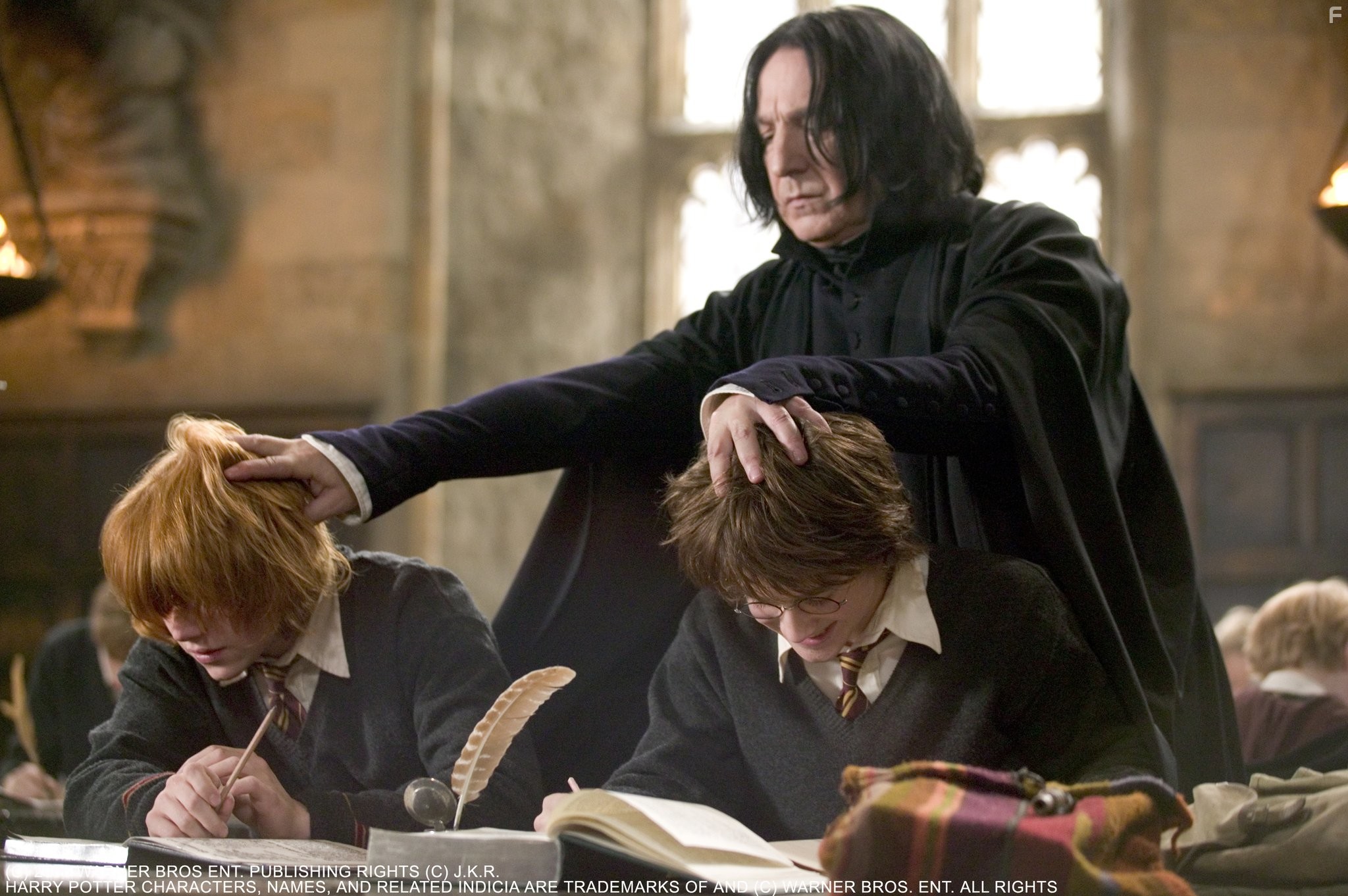 Alan Rickman, Rupert Grint, and Daniel Radcliffe in Гарри Поттер и кубок огня (2005)