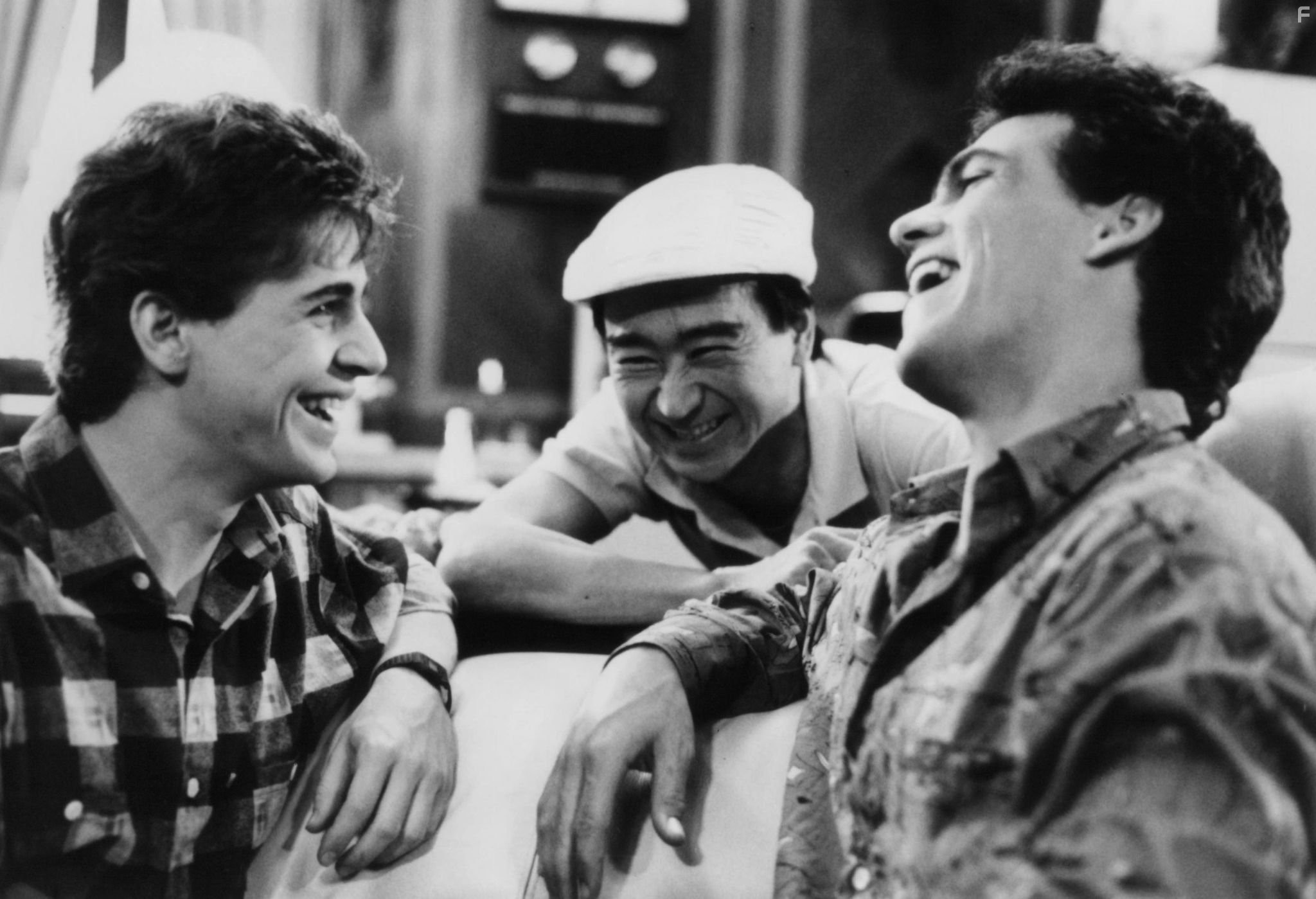 Chris Makepeace, Robert Rusler, and Gedde Watanabe in Вамп (1986)
