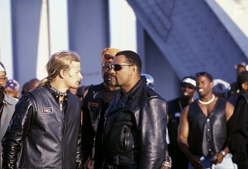 Dogg (KID ROCK, center left) challenges Smoke (LAURENCE FISHBURNE, center right) to a race as Soul Train (ORLANDO JONES, far left) and Motherland (DJIMON HOUNSOU, center) look on.