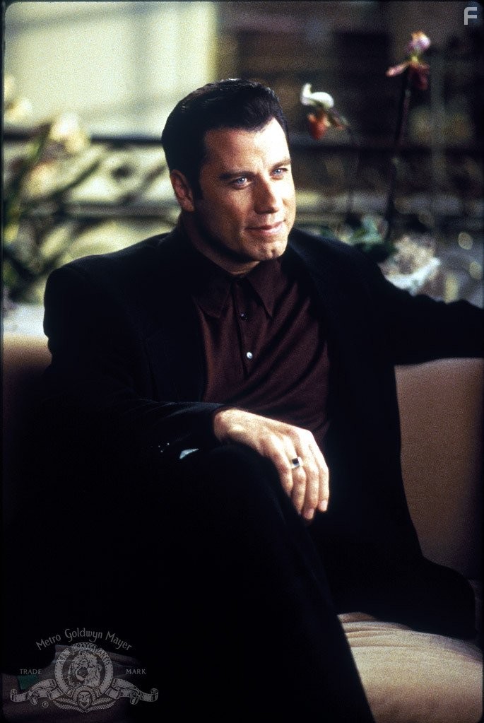 John Travolta in Достать коротышку (1995)