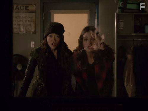 Arden Cho and Crystal Reed in Оборотень (2011)