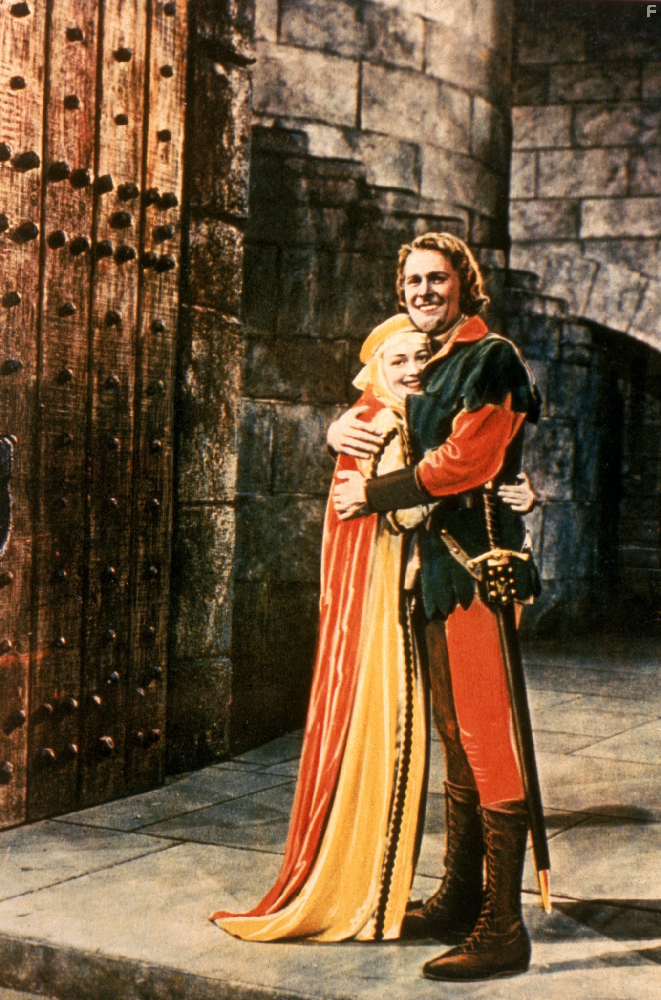 Olivia de Havilland and Errol Flynn in Приключения Робин Гуда (1938)