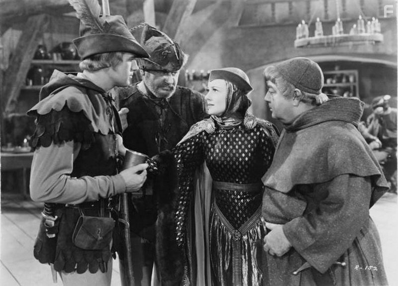 Olivia de Havilland, Errol Flynn, Alan Hale, and Eugene Pallette in Приключения Робин Гуда (1938)