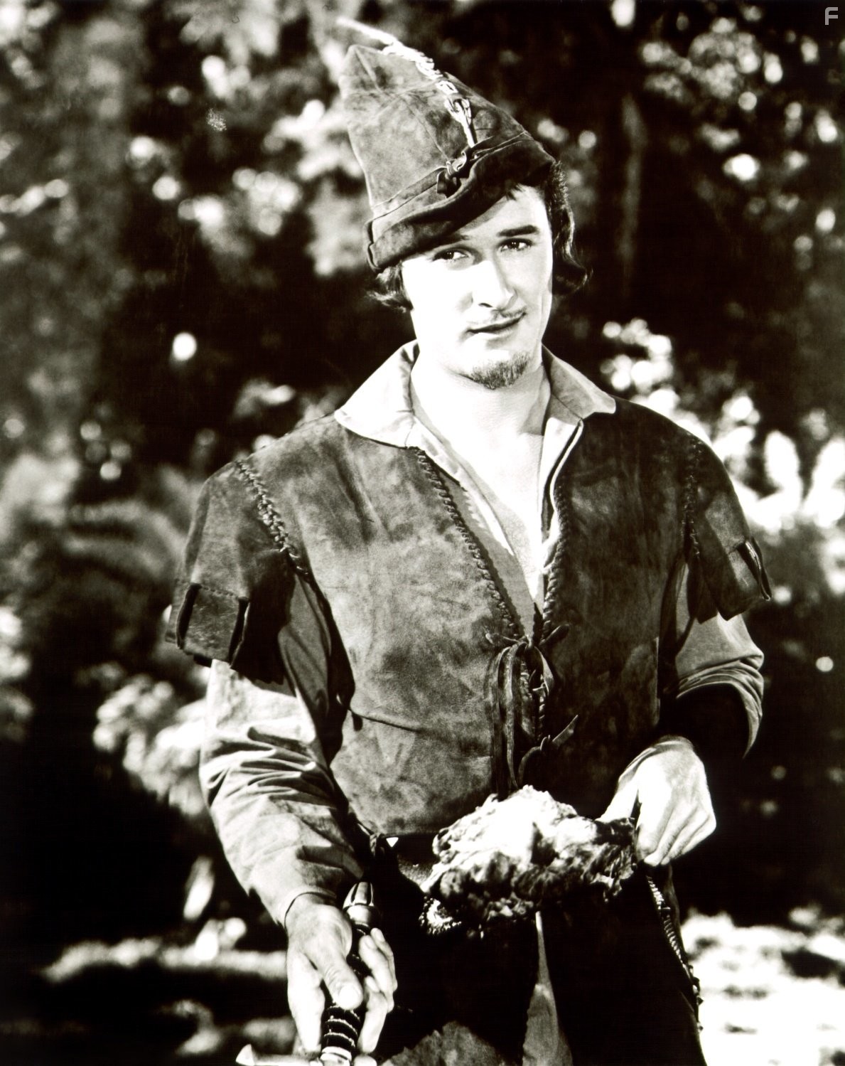 Errol Flynn in Приключения Робин Гуда (1938)