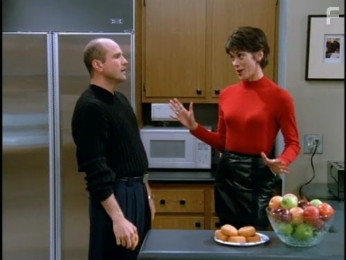 Wendie Malick and Enrico Colantoni in Журнал мод (1997)