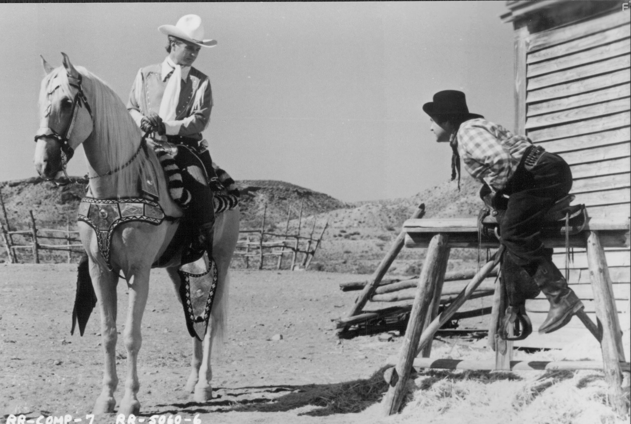 Tom Berenger and G.W. Bailey in Ковбойская рапсодия (1985)