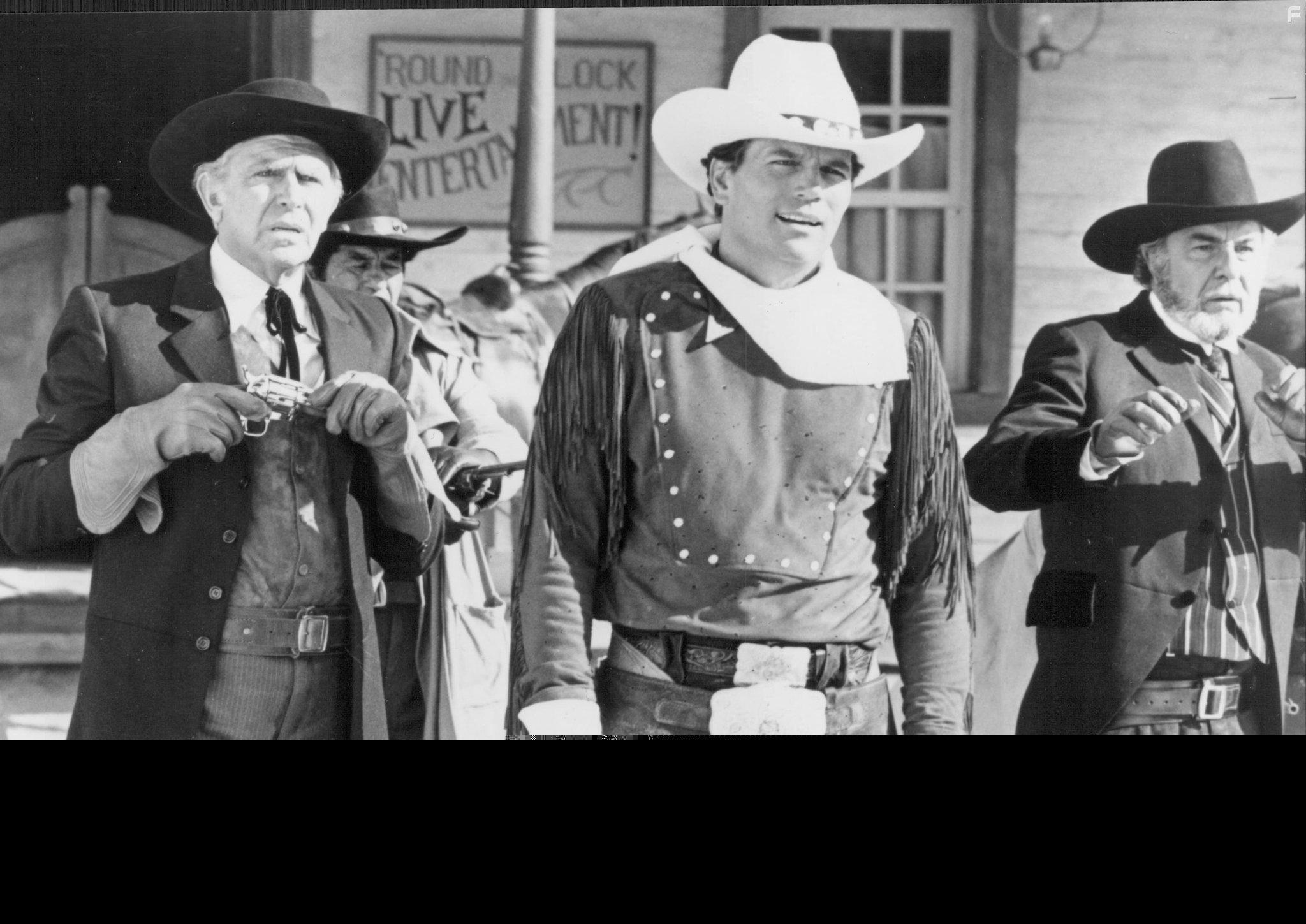 Andy Griffith, Fernando Rey, and Patrick Wayne in Ковбойская рапсодия (1985)