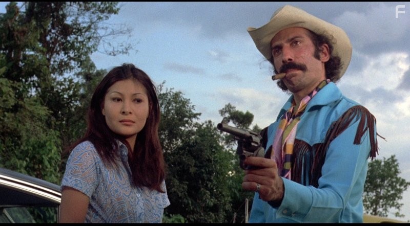 Carpi Asturias and Sid Haig in Чeрная мама, белая мама (1973)