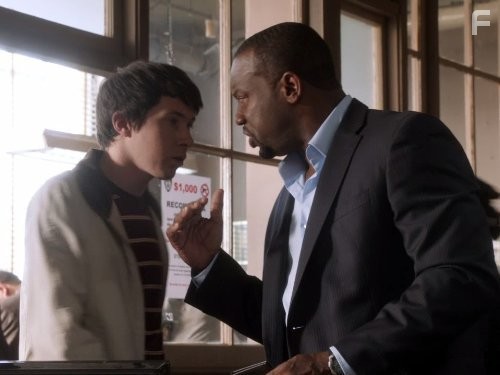 Ryan Cartwright and Malik Yoba in Люди Альфа (2011)
