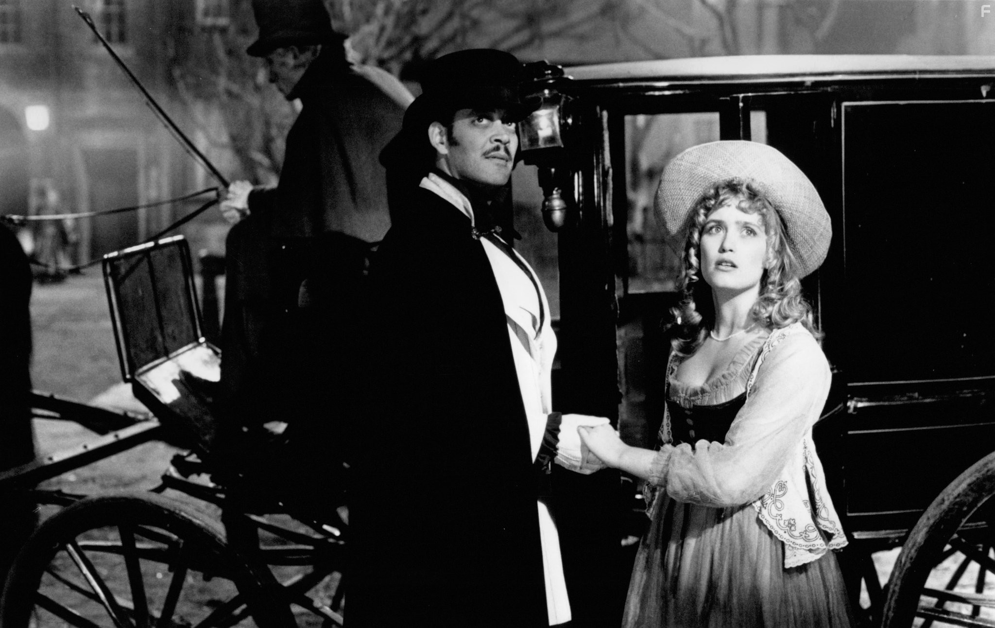 Raul Julia in Mack the Knife (1989)