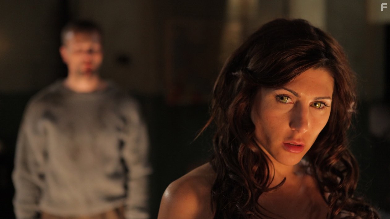 Still of Craig Hall and Gina Varela in The Devil's Rock