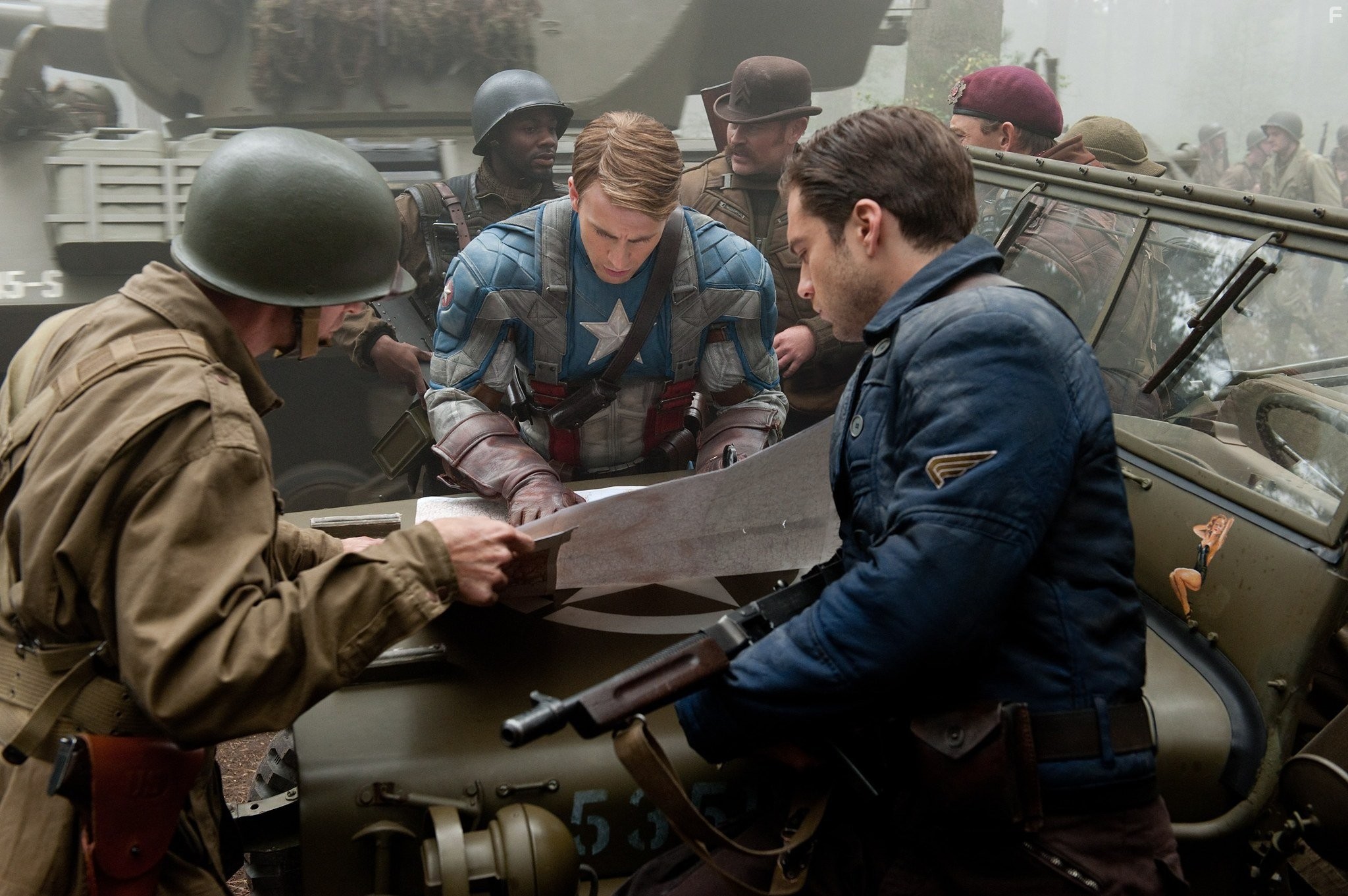 Chris Evans, Neal McDonough, Derek Luke, and Sebastian Stan in Первый мститель (2011)
