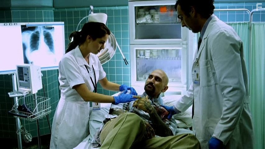Robert LaSardo and Christine Donlon in Femme Fatales (2011)