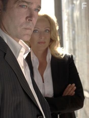 Ray Liotta and Virginia Madsen in Воры Экстра класса (2006)
