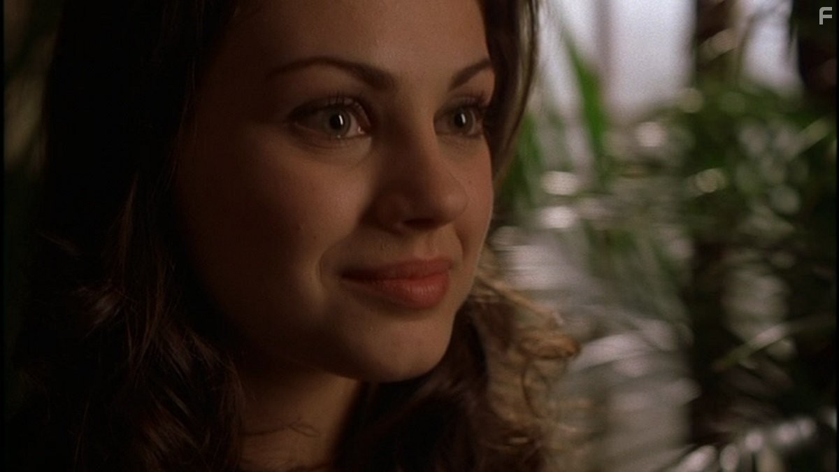 Mila Kunis in Американский психопат 2: Стопроцентная американка (2002)