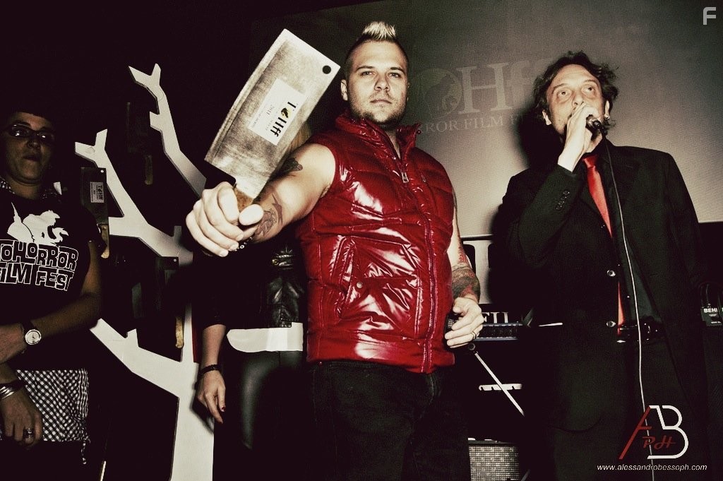 Matt Farnsworth accepts the Antonio Margheriti award at Tohorror Italy for his creation of "The Orphan Killer"