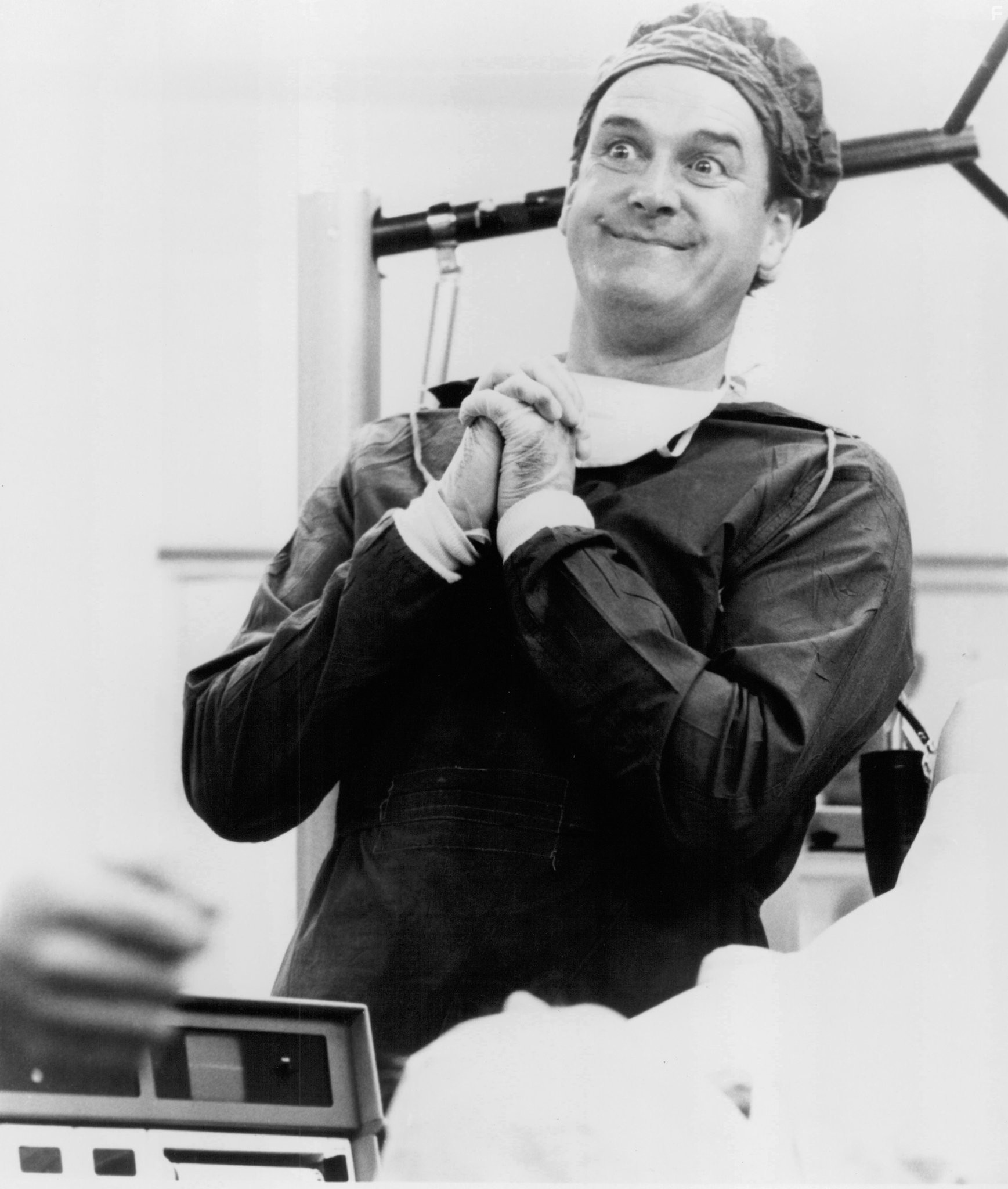 John Cleese in Смысл жизни по Монти Пайтону (1983)