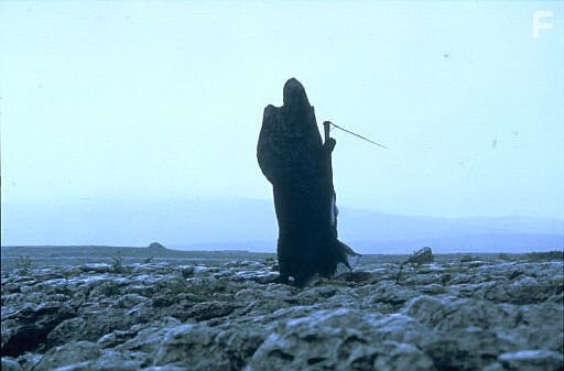 John Cleese in Смысл жизни по Монти Пайтону (1983)