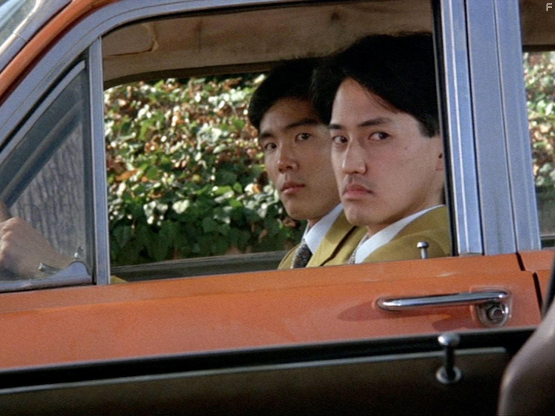 Brian Imada and Yuji Okumoto in Уж лучше умереть (1985)
