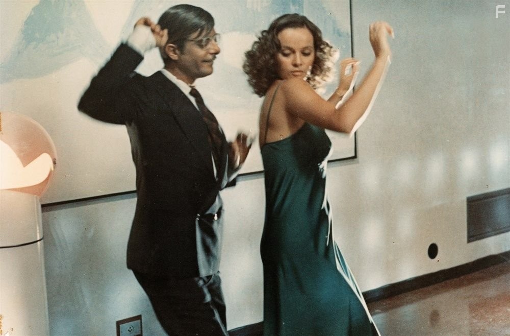 Laura Antonelli and Giancarlo Giannini in Sessomatto (1973)