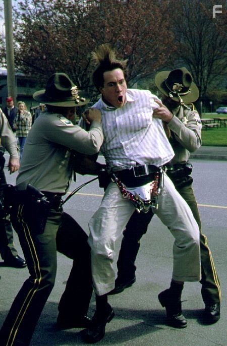 Gilly is locked into "The Disabler" (a male chastity belt) when he's arrested for sexual deviancy