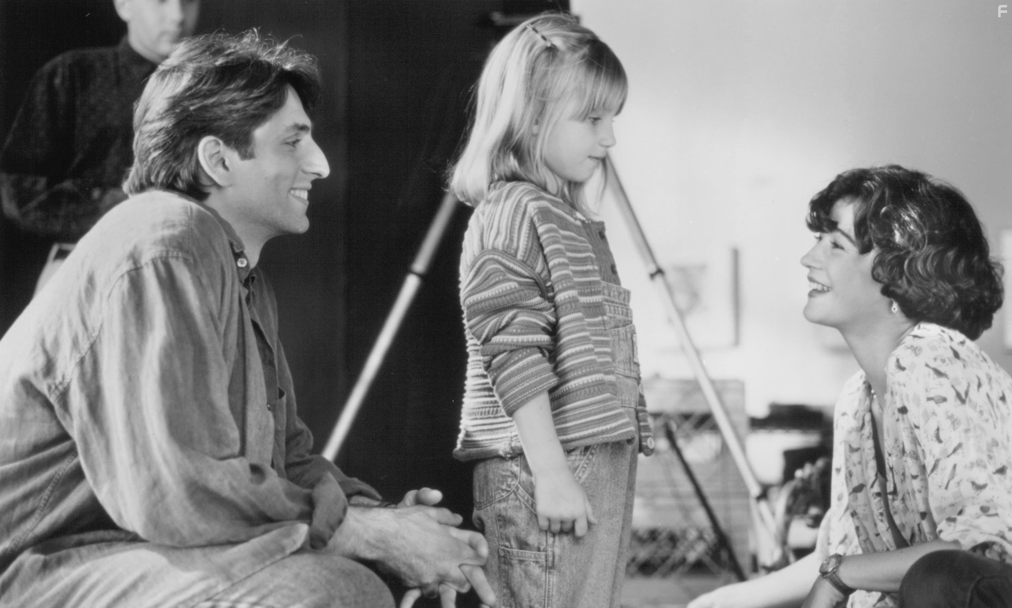 Vincent Spano, Julia Devin, and Moira Kelly in The Tie That Binds (1995)