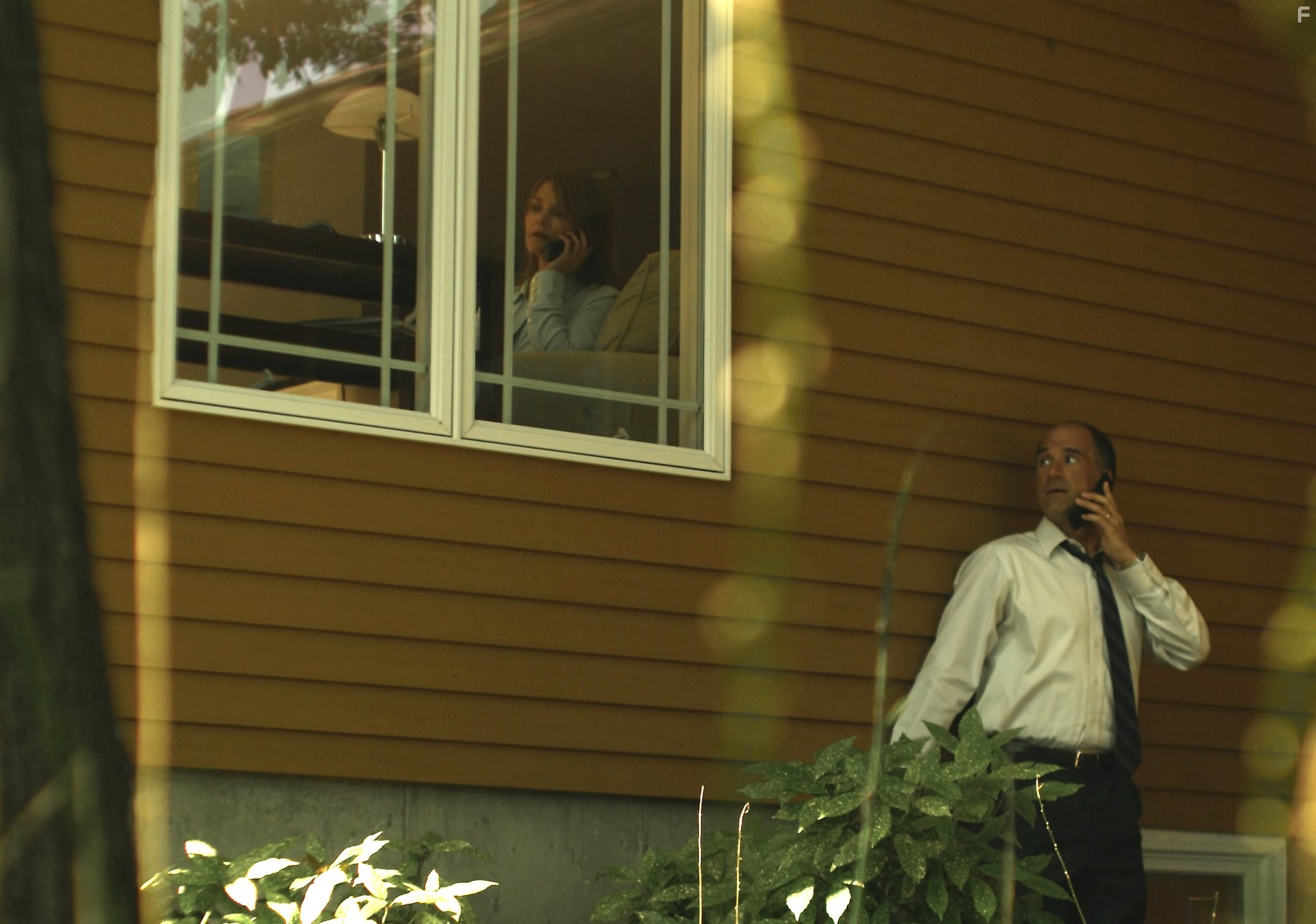 Elias Koteas and Kathryn Erbe in 3 Backyards (2010)