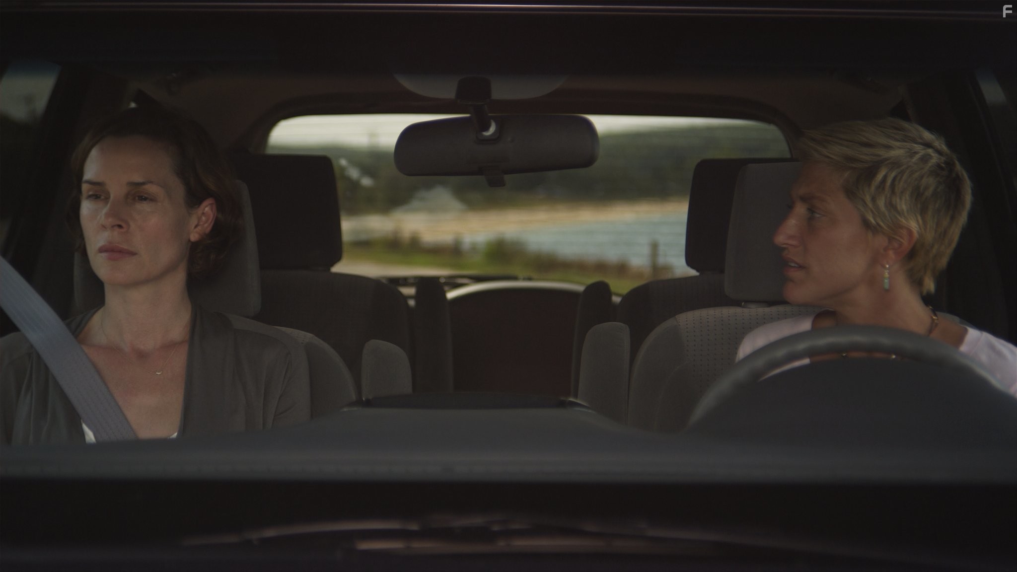 Embeth Davidtz and Edie Falco in 3 Backyards (2010)