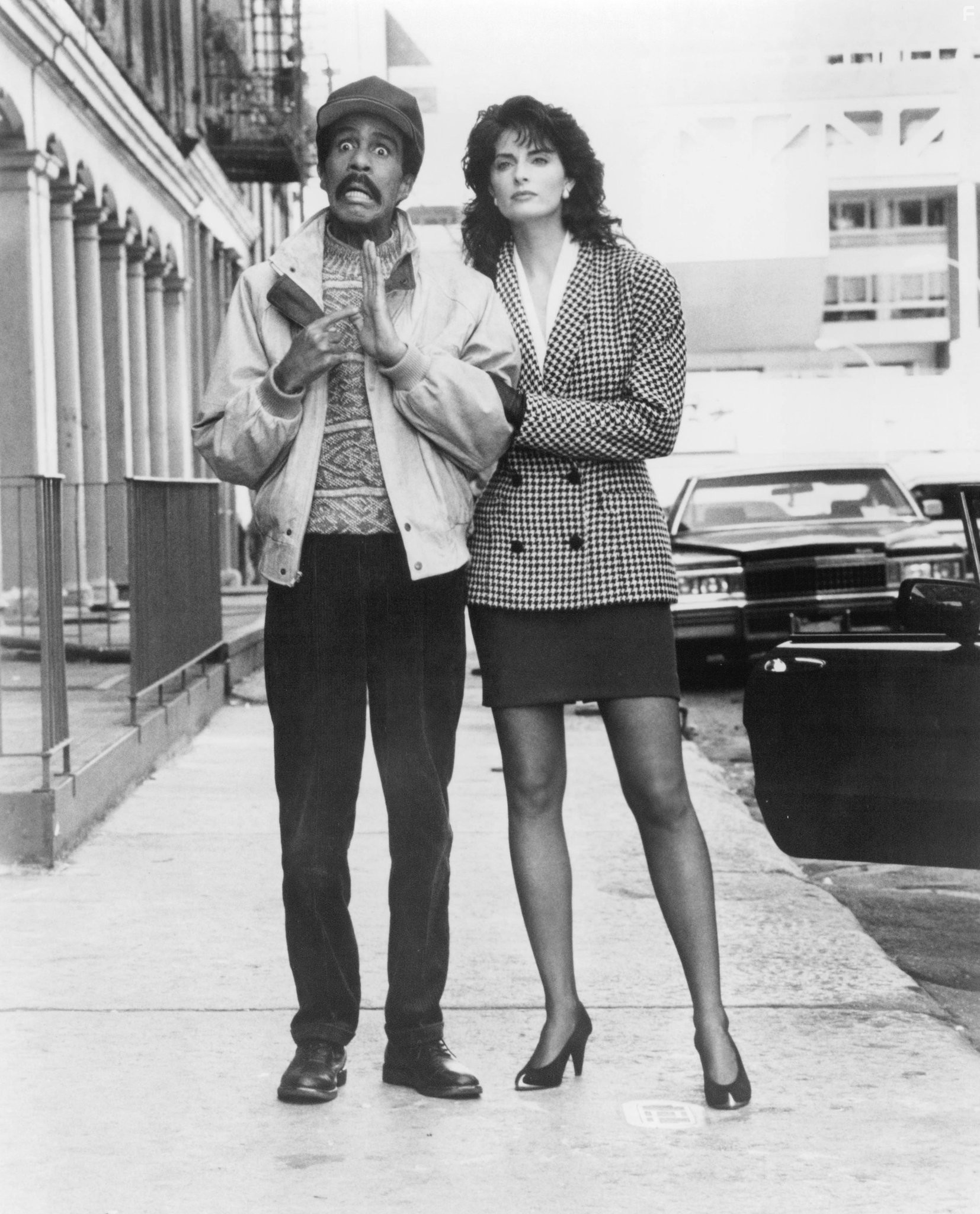 Joan Severance and Richard Pryor in Ничего не вижу, ничего не слышу (1989)