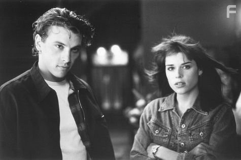 Neve Campbell and Skeet Ulrich in Крик (1996)