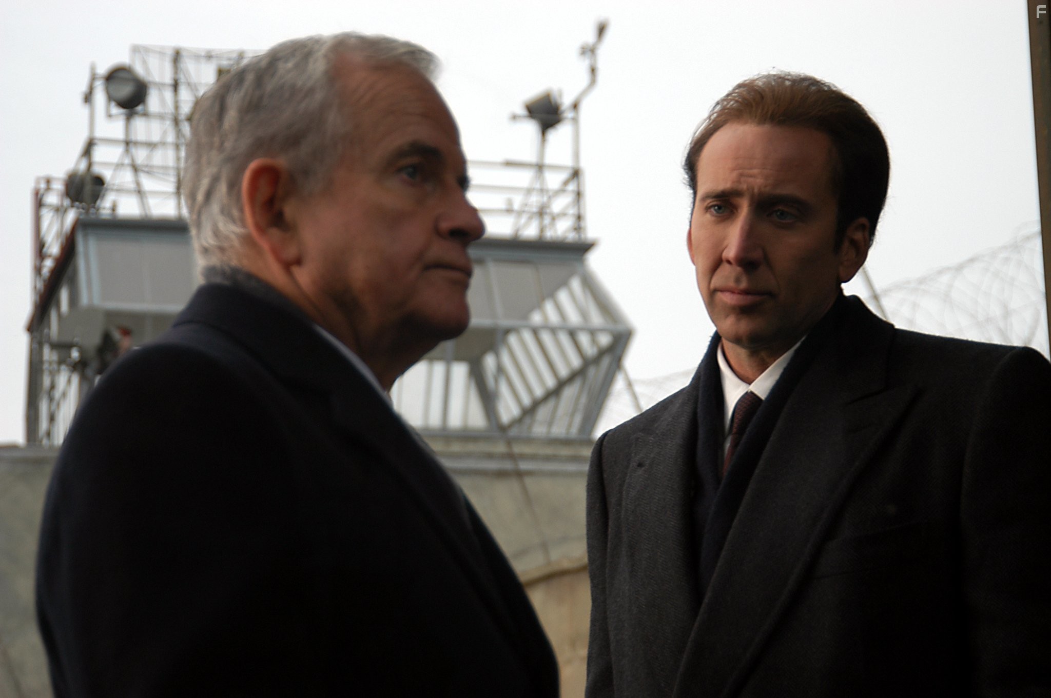 Nicolas Cage and Ian Holm in Оружейный барон (2005)