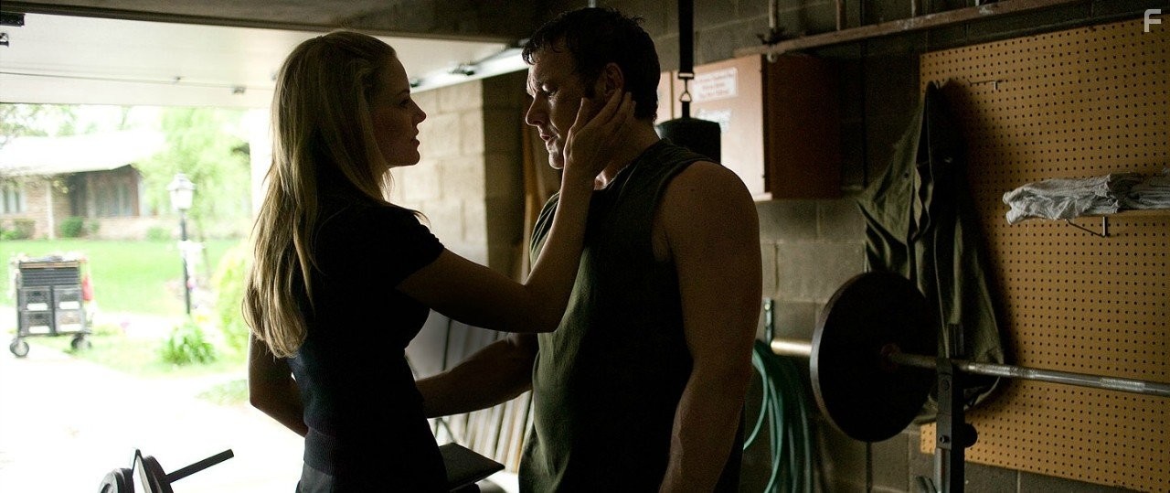 Joel Edgerton and Jennifer Morrison in Воин (2011)