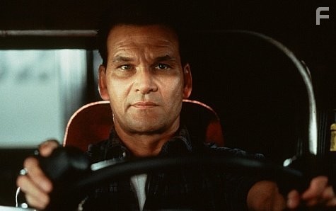 Patrick Swayze stars as Jack Crews, an ex-con who is duped into driving a sm i-truck loaded with illegal weapons.