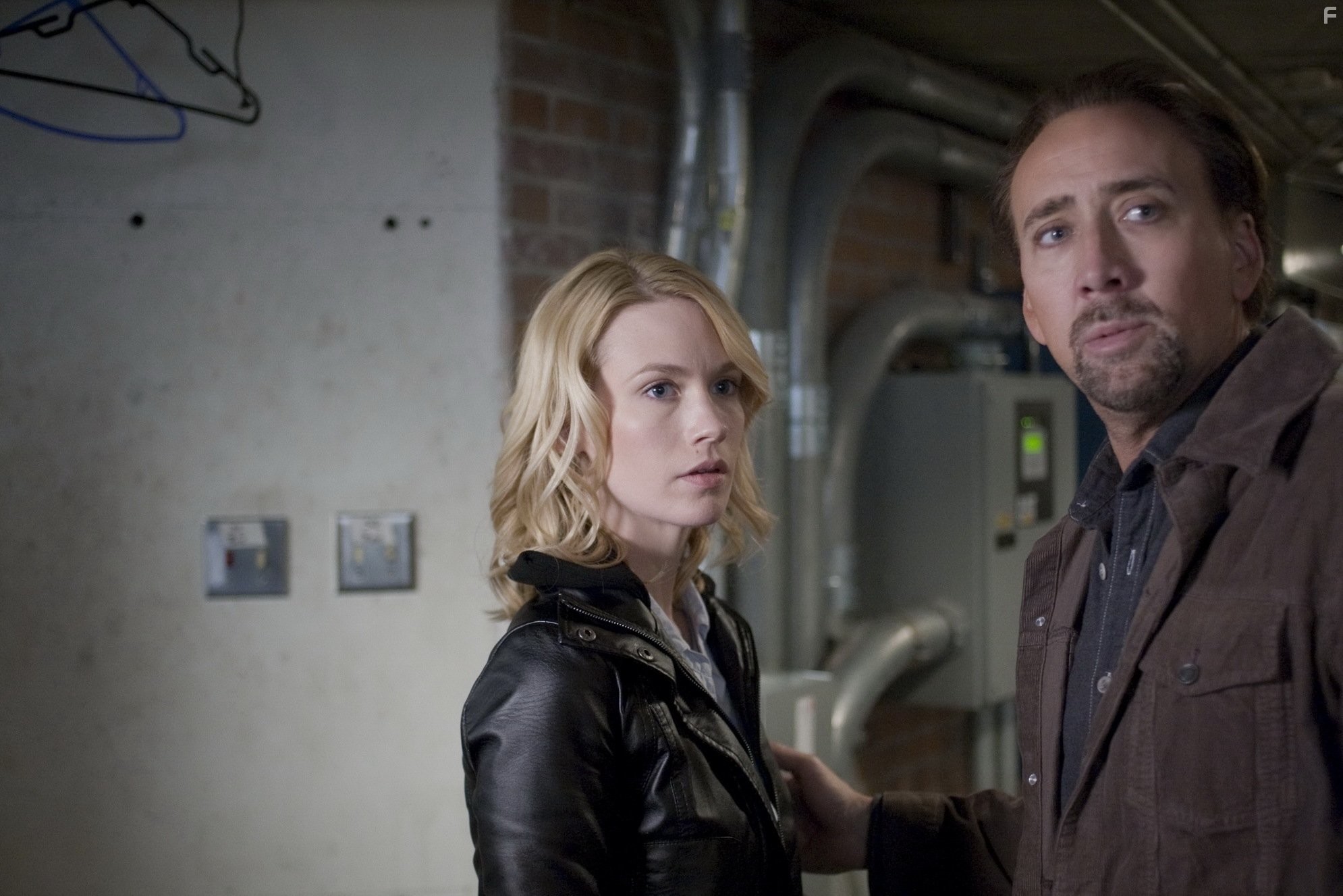 Nicolas Cage and January Jones in Голодный кролик атакует (2011)