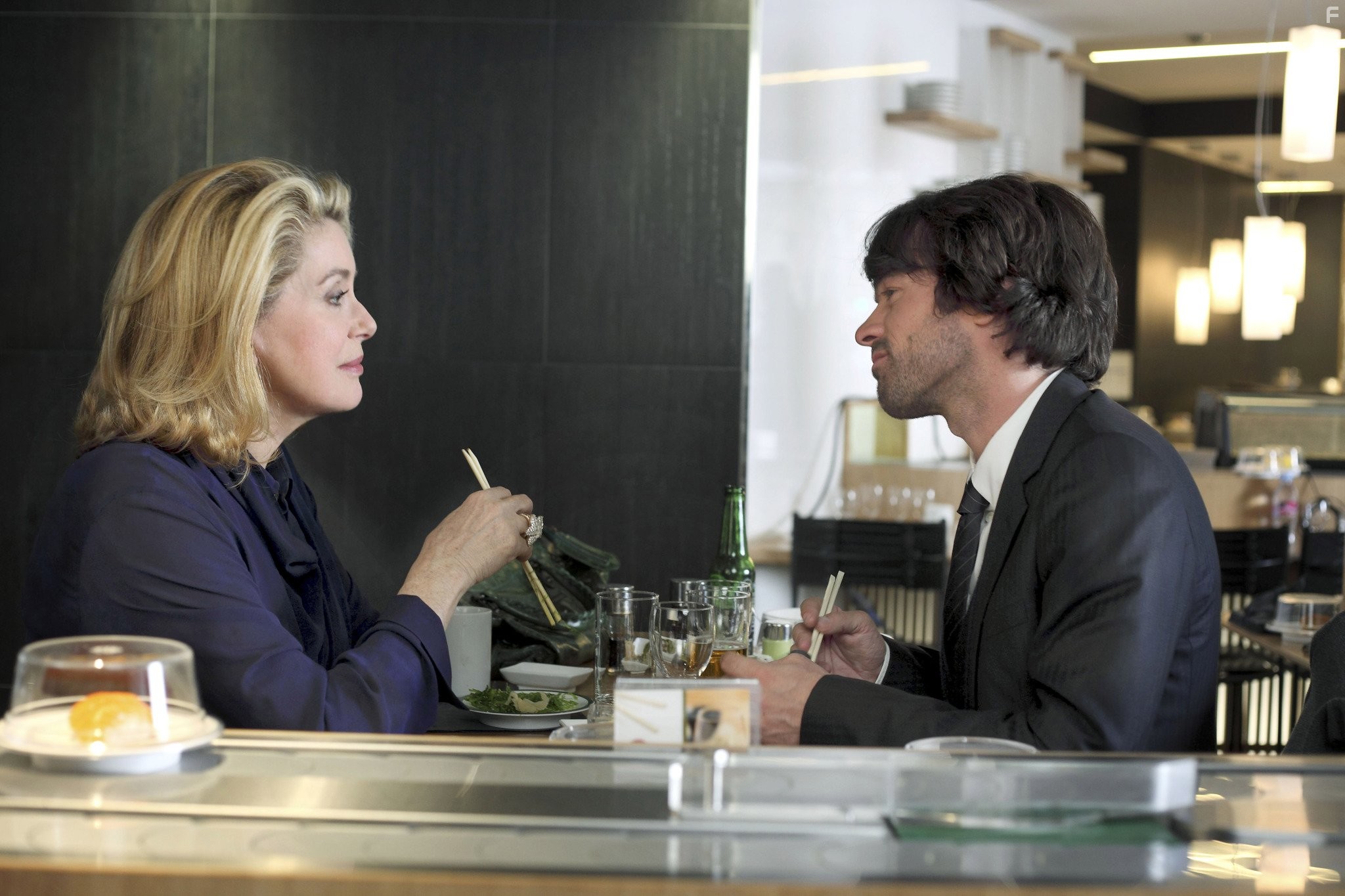Catherine Deneuve and Romain Duris in Человек, который хотел жить по-своему (2010)